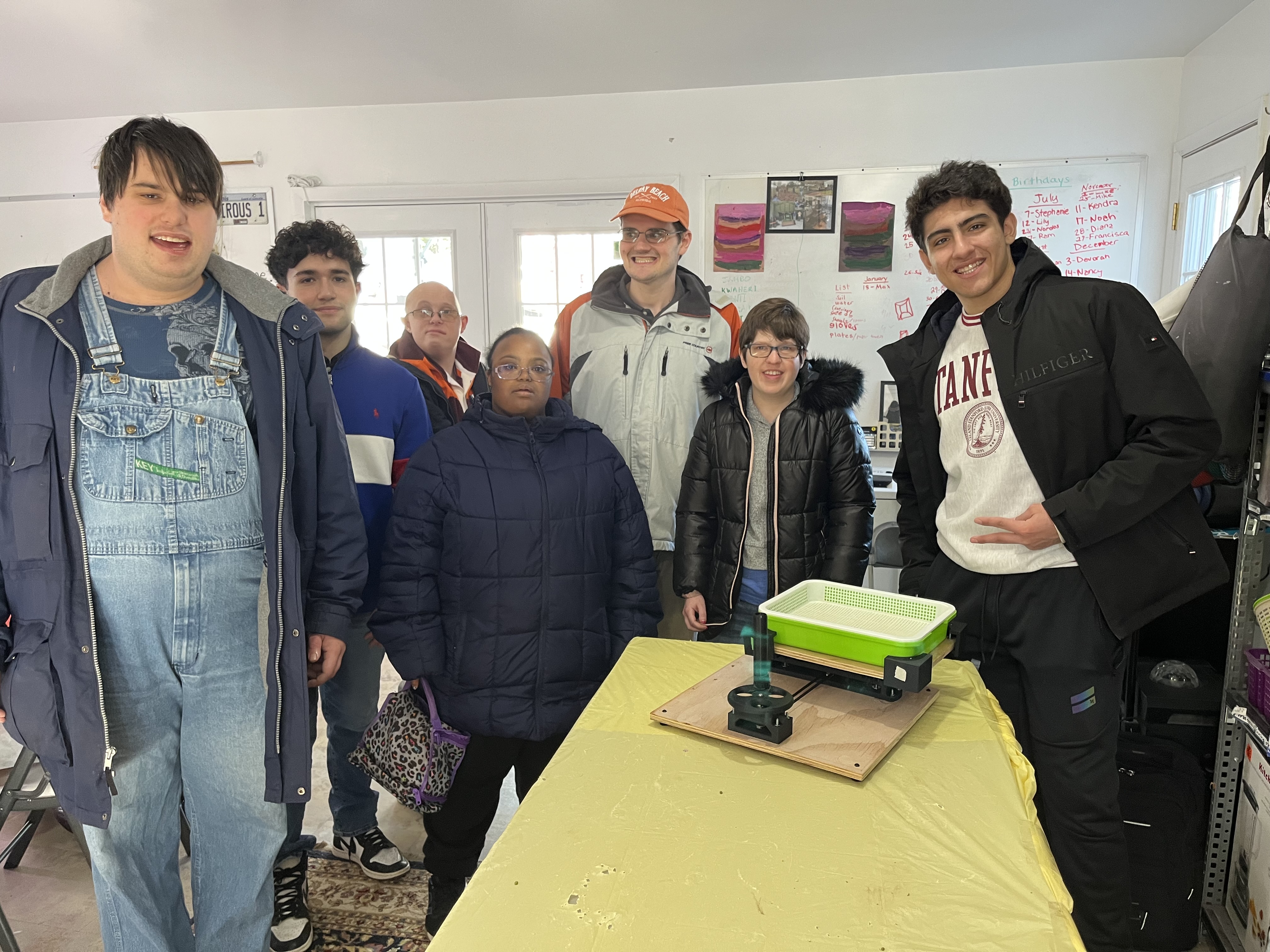 Engineering team with their completed project